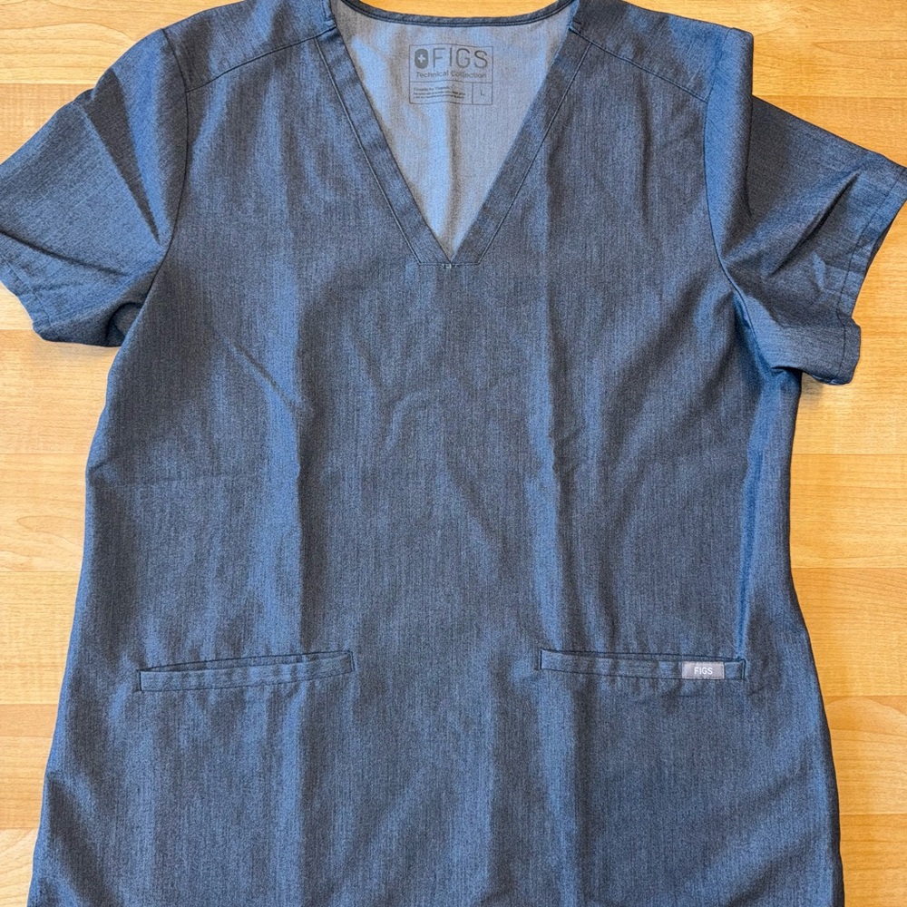 Figs Denim Blue Scrub Top. Woman’s size large.